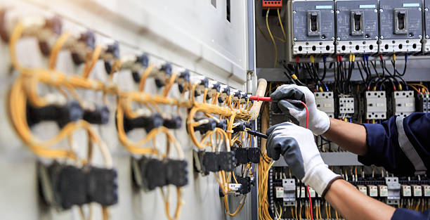 Professional Electrician technician working in Denison, TX